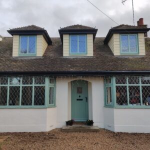 Green Casement Windows at the front of a house