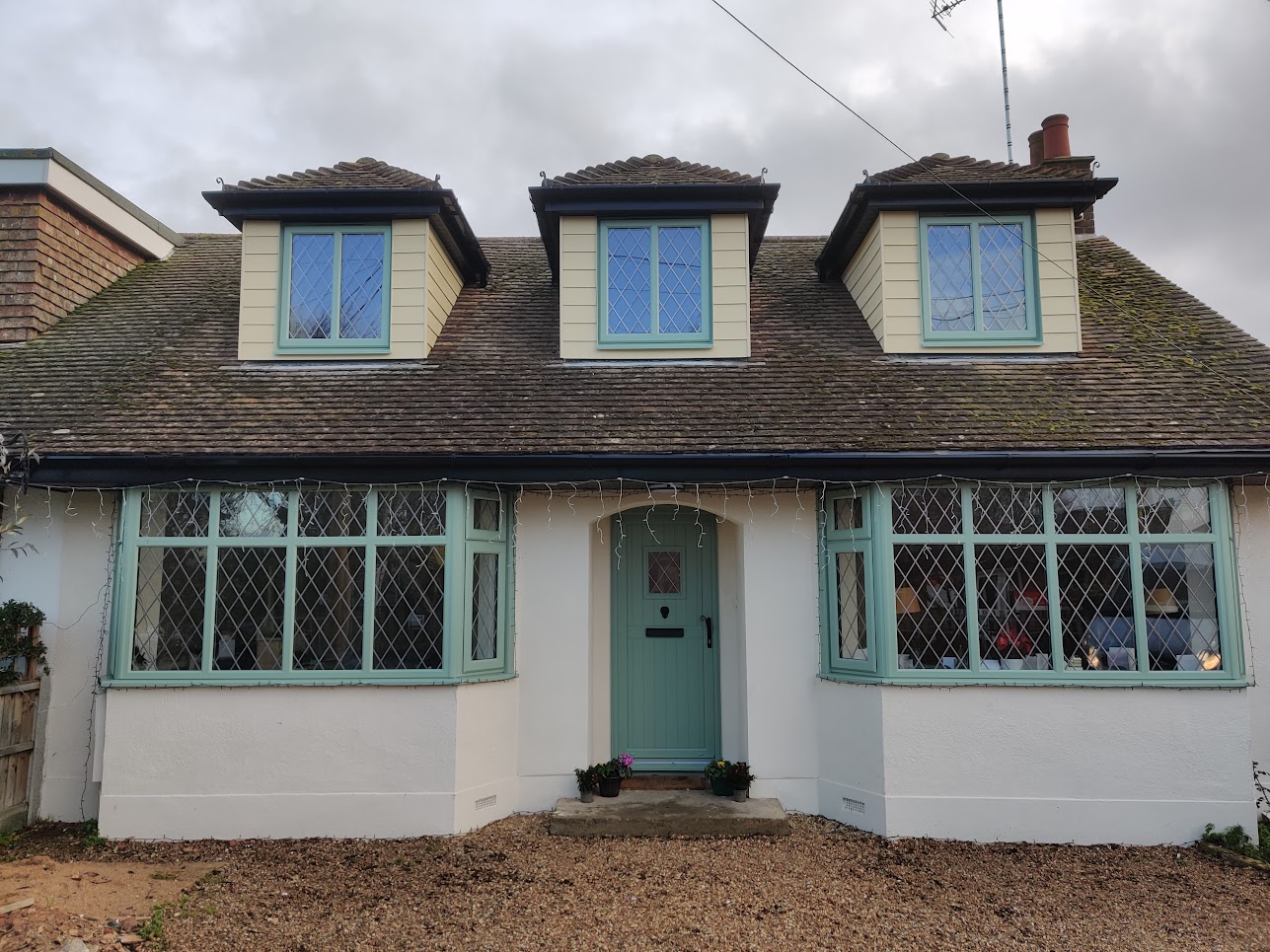 Green Casement Windows at the front of a house