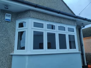 A uPVC splay bay window from the outside.