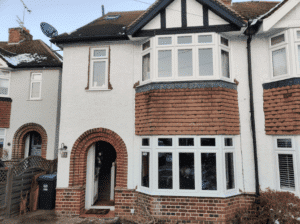 A home with two splay bay windows on the first and second floor