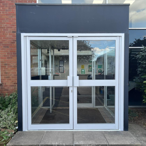 An example of a white uPVC double door fitted for a local packaging company in Southend on Sea