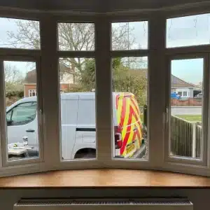 A white uPVC window from inside the property.